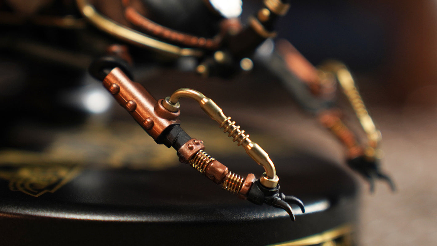 Close-up of a decorative metal object with intricate designs on a blurred background